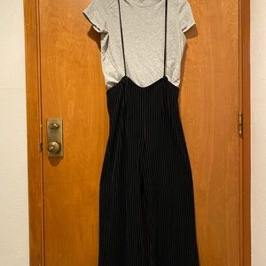 Lucca, size small. Black stripe jumper.
